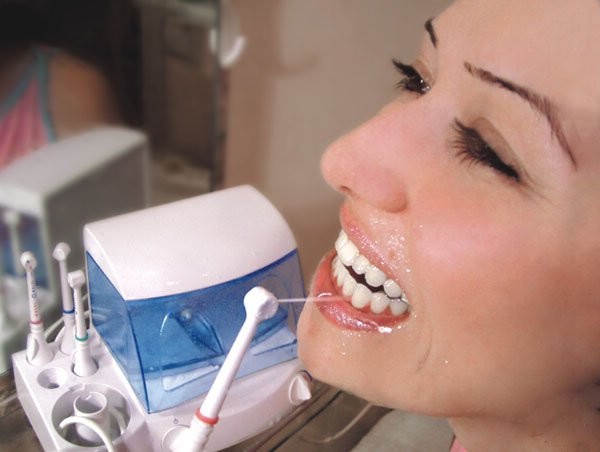 Что такое ирригатор для зубов и полости рта